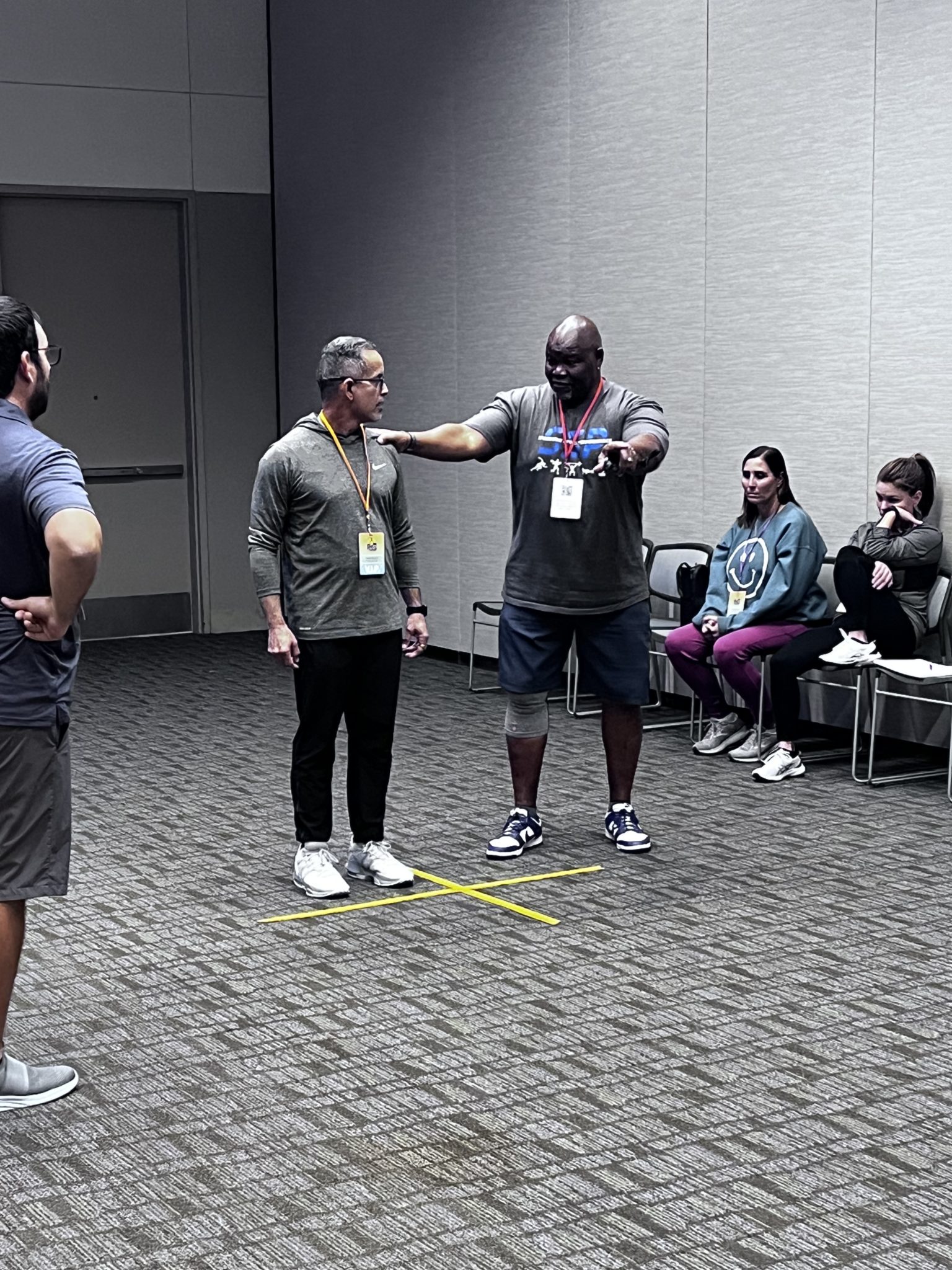 Shawn Jenkins demonstrating a movement pattern at a clinic